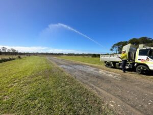Dual function water tipper truck